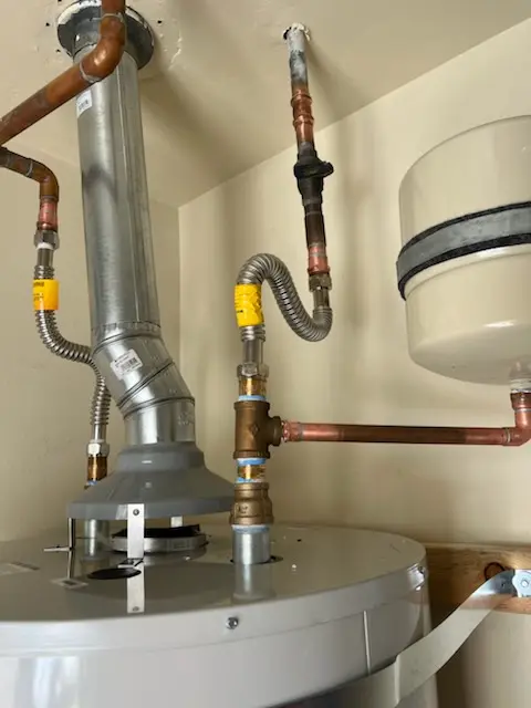 Water heater installation and plumbing repair in Loring Park
